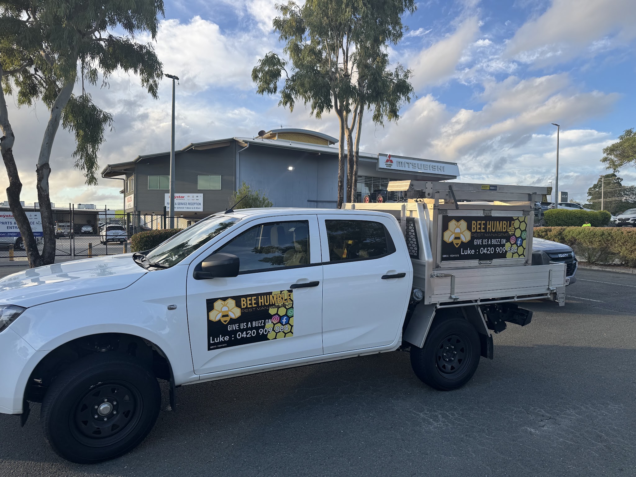 The Bee Humble Pest Management ute with its honeycomb signage